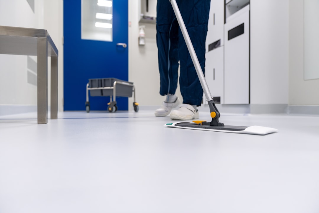 about-01 Cleaner cleaning the floor in a laboratory environment
